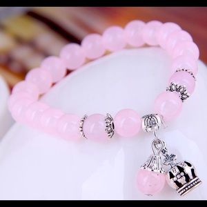 Baby pink metal crown and ball bracelet